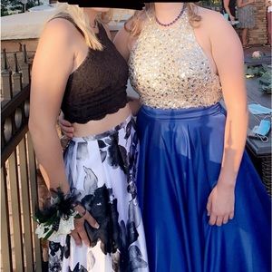 Size 2 prom dress has been altered. Two piece.